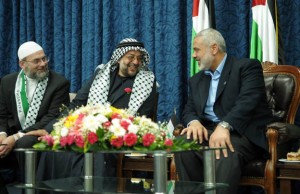 ibrahim hewitt and essam mustafa of interpal with their hamas master ismail haniyeh